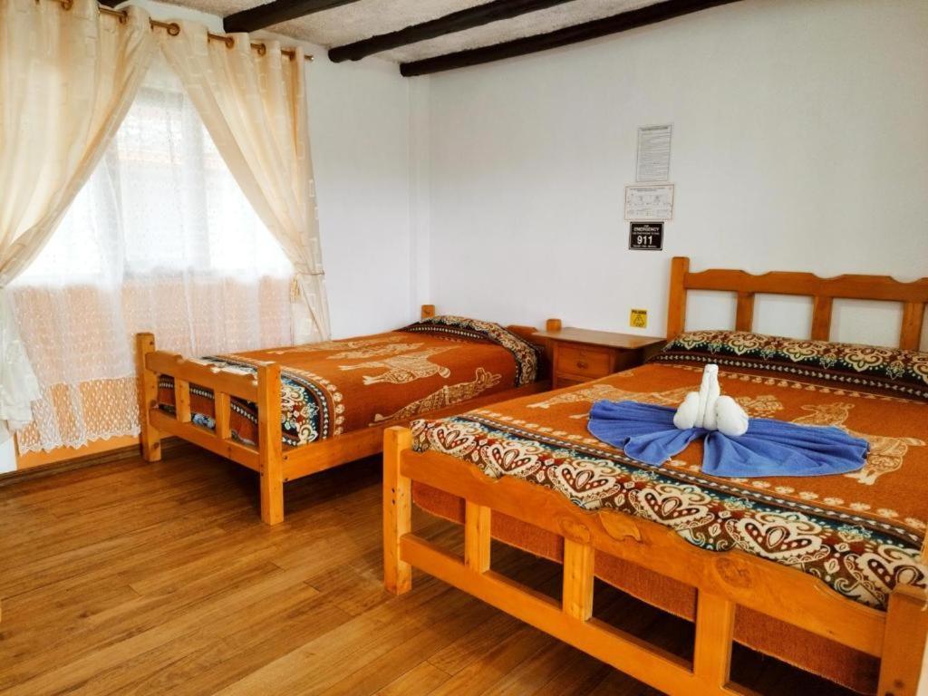 Hostal Taita Cristobal Isinlivi Esterno foto